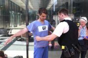 GPs who cracked JP Morgan windows in climate protest found not guilty of criminal damage