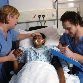 hospital staff with patient third place 330x330px